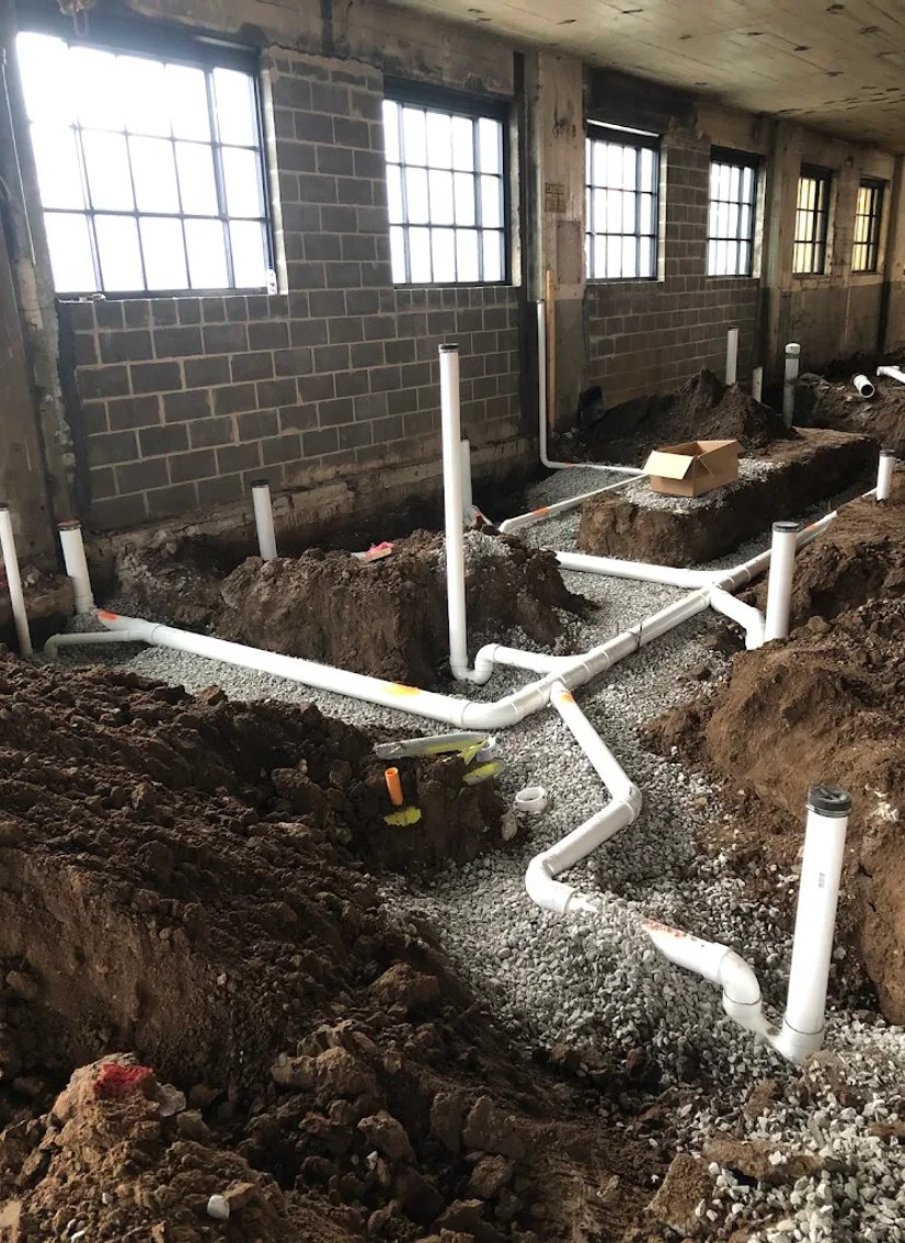 basement rough plumbing with PVC drain lines