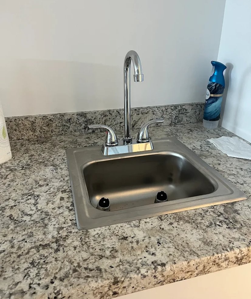 completed kitchen sink and faucet installation
